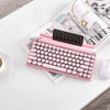 pink-retro-typewriter-keyboard-holder