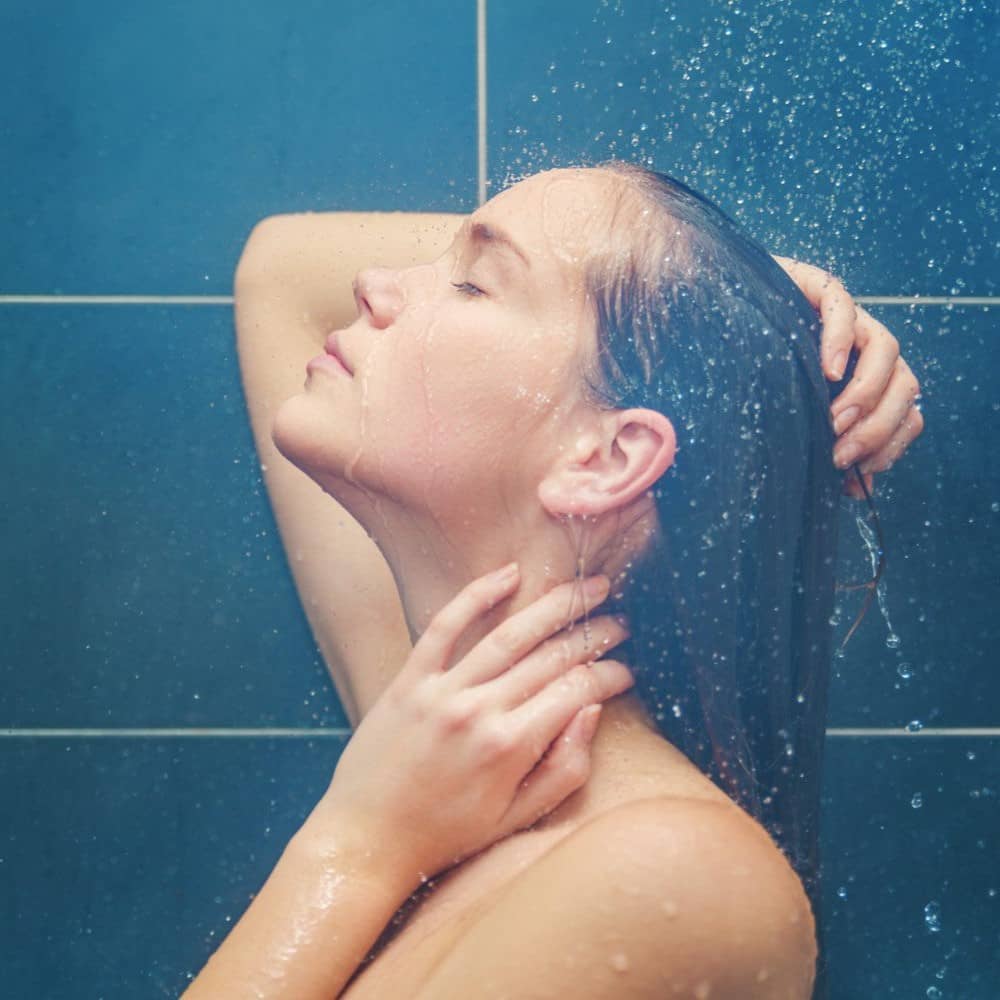 sleek-filtered-beauty-shower-head-lady